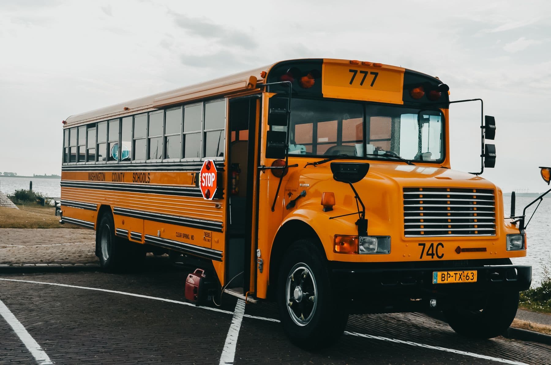 School bus parked outside a school